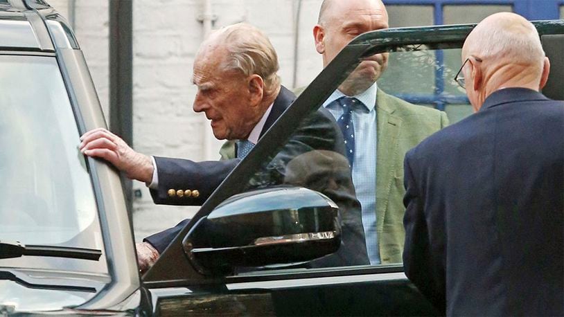 Britain's Prince Philip leaves King Edward VII Hospital in London, Tuesday Dec. 24, 2019.