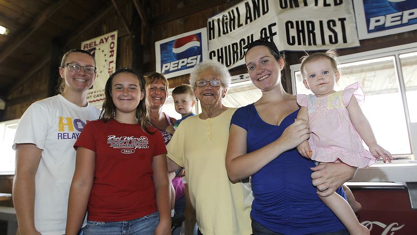 Betty Mougey, center, poses with her daughters, granddaughters and great grandchildren in the Highland United Church of Christ cafeteria which she helped build 65 years ago. This is the last year the church will operate the cafeteria. Posing with Betty are, from left, Lydia Vlcek, Alysha Vlcek, Tammy Vlcek, Wyatt Vlcek, Victoria Smitson and Lillie-Mae Smitson. Bill Lackey/Staff