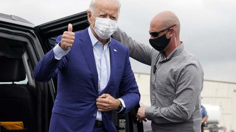 Democratic presidential candidate and former Vice President Joe Biden arrives to board a plane at New Castle Airport in New Castle, Delaware, on Wednesday, Sept. 9, 2020, en route to campaign events in Michigan.