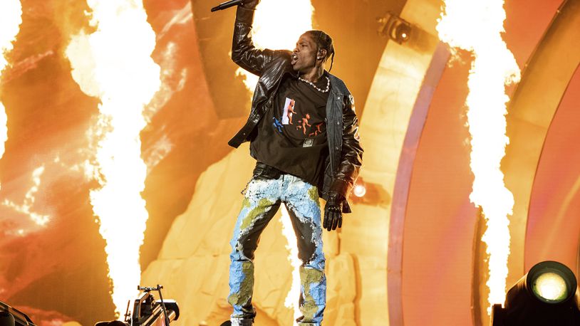 FILE - Travis Scott performs at the Astroworld Music Festival in Houston, Nov. 5, 2021. A judge in Texas is expected hear arguments Monday, April 15 2024, in Scott's request to be dismissed from a lawsuit over the deadly 2021 Astroworld festival. (Photo by Amy Harris/Invision/AP, File)