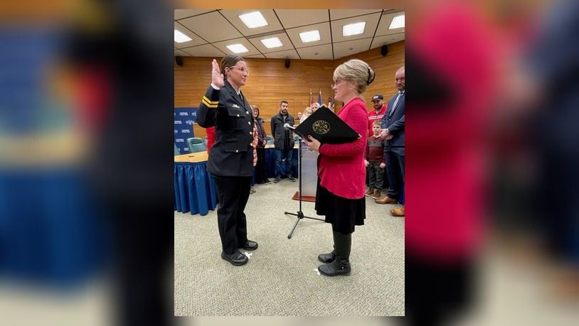 Allison Elliott takes the oath of office as the new Springfield chief of police on Tuesday, Dec 20, 2022, administered by Jill Pierce, city clerk. CONTRIBUTED