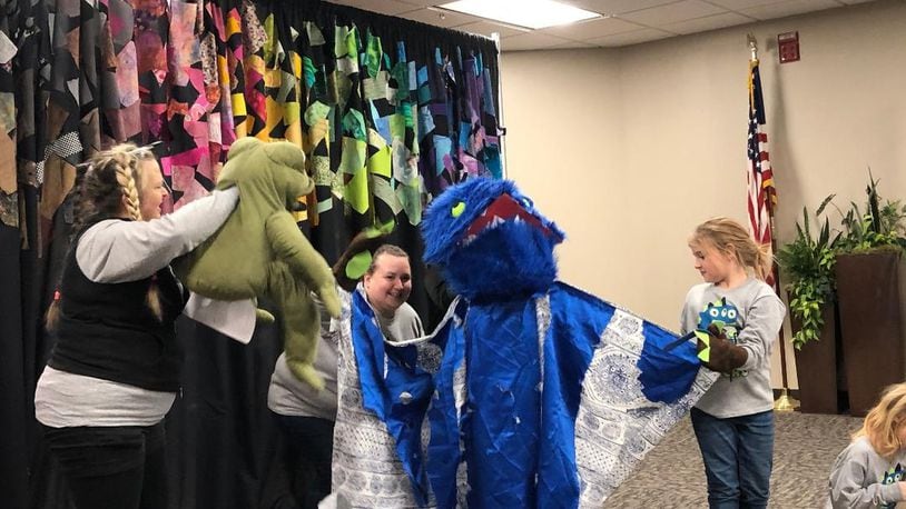 Families created their own monsters who talked about their feelings during man-on-the-street interviews Friday during the finale of Project Jericho’s Winter Family Arts Camp at Clark State’s Brinkman Educational Center. Photo by Brett Turner