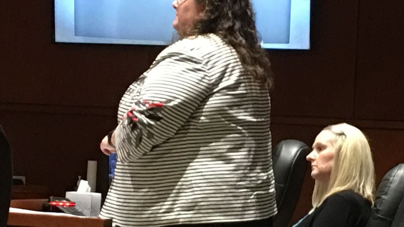 Former Springboro teacher Amy Panzeca listens as lawyer Andrea Ostrowski questions witnesses in court Wednesday, Aug. 8, 2018, in Lebanon. Her trial is to begin Monday. LAWRENCE BUDD/STAFF