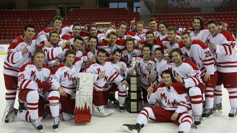 Miami University’s hockey team poses with the Central Collegiate Hockey Association regular-season trophy during a ceremony at Steve Cady Arena in Oxford on Tuesday. Photo courtesy of Miami University Athletics