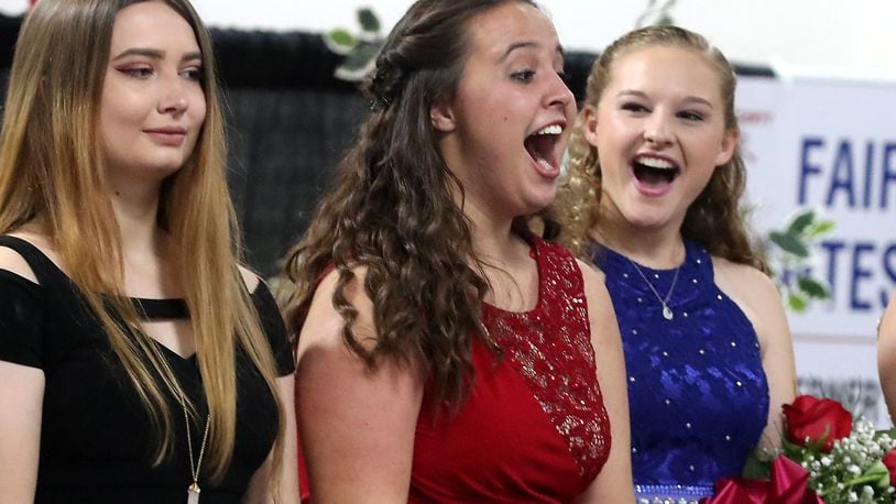 Emma Hardacre, center, reacts as her name is announced as the 2018 Clark County Fair Queen Saturday, July 21, 2018. Emma is from the Global Impact STEM Academy. Her mother was also a Clark County Fair Queen. BILL LACKEY/STAFF