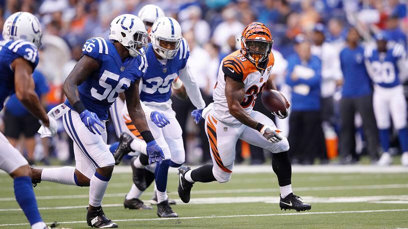 INDIANAPOLIS, IN - AUGUST 31: Jarveon Williams #39 of the Cincinnati Bengals runs the ball against the Indianapolis Colts in the first half of a preseason game at Lucas Oil Stadium on August 31, 2017 in Indianapolis, Indiana. (Photo by Joe Robbins/Getty Images)