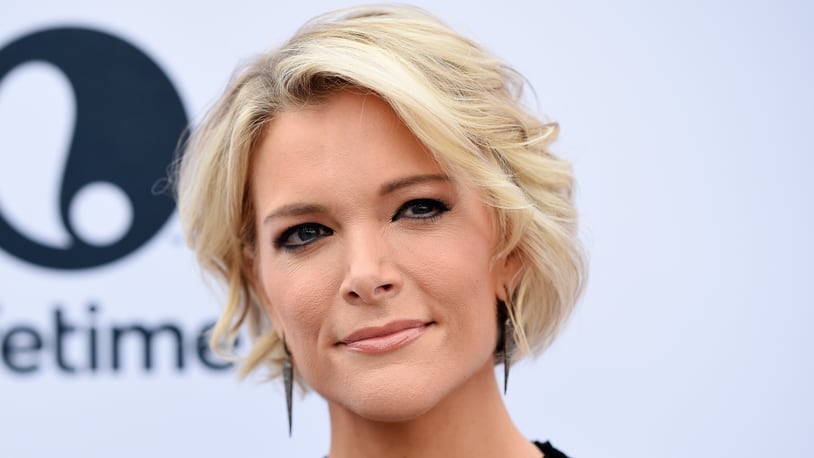 FILE - In this Dec. 7, 2016 file photo Megyn Kelly poses at The Hollywood Reporter's 25th Annual Women in Entertainment Breakfast in Los Angeles. Kelly defended her decision to feature "InfoWars" host Alex Jones on her NBC newsmagazine despite taking heat Monday from families of Sandy Hook shooting victims and others, saying it's her job to "shine a light" on newsmakers. Critics argue that NBC's platform legitimizes the views of a man who, among other conspiracy theories, has suggested that the killing of 26 people at the Sandy Hook Elementary School in Newtown, Connecticut, in 2012 was a hoax. (Photo by Chris Pizzello/Invision/AP, File)