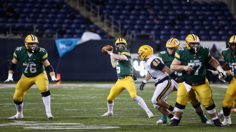 Lakewood St. Edward's Casey Bullock throws a pass in the Division I state championship game on Friday, Dec. 2, 2022, at Tom Benson Hall of Fame Stadium in Canton. David Jablonski/Staff