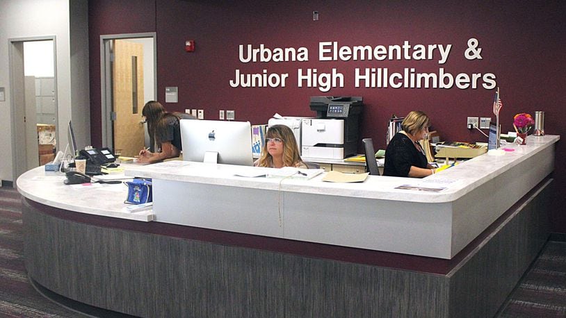 Staff work in the office area at Urbana Elementary and Junior High School. JEFF GUERINI/STAFF
