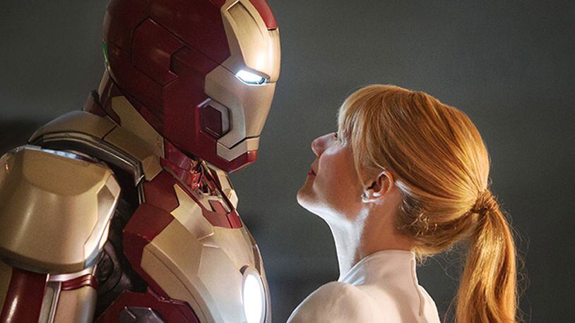 This film publicity image released by Disney-Marvel Studios shows Robert Downey Jr., left, as Tony Stark/Iron Man and Gwyneth Paltrow as Pepper Potts in a scene from "Iron Man 3." (AP Photo/Disney, Marvel Studios)