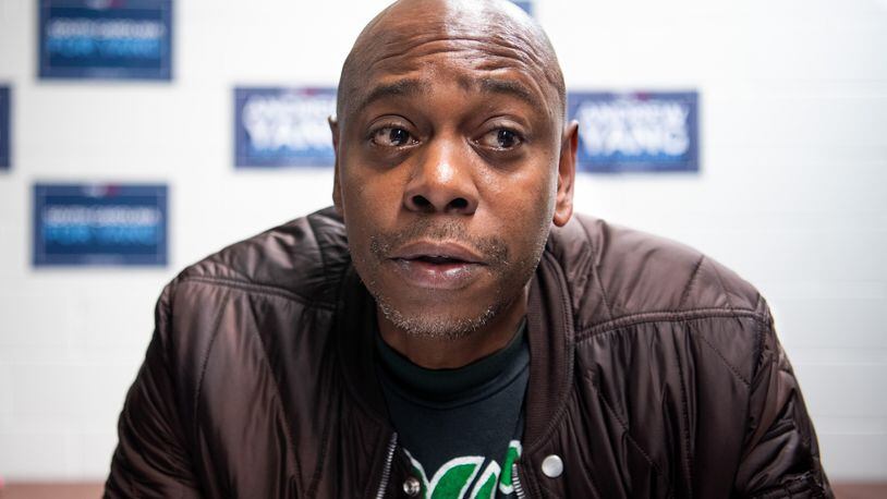 Comedian Dave Chappelle talks with the media while campaigning for Democratic presidential candidate Andrew Yang on Jan. 30, 2020, in North Charleston, South Carolina. (Sean Rayford/Getty Images/TNS)