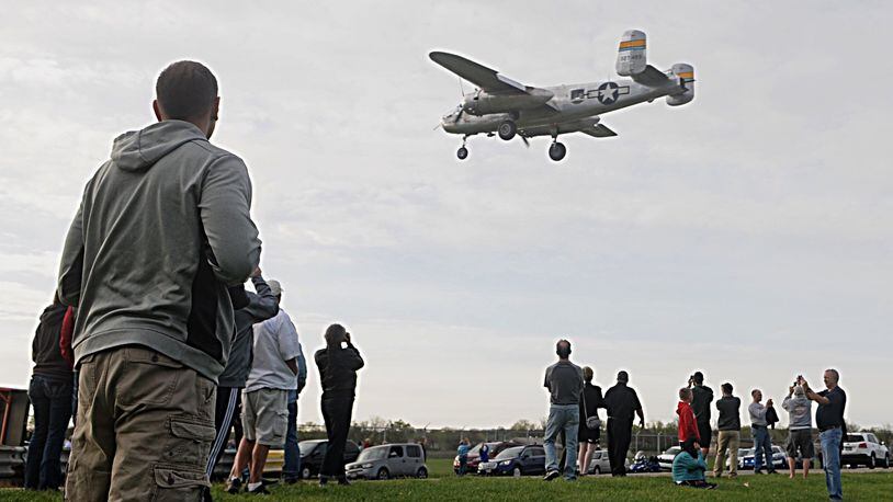 Thousands of people swarmed onto the airstrip at the National Museum of the U.S. Air Force on Monday as 11 World War II era B-25s landed to mark the 75th anniversary of the historic Doolittle Raiders attack against Japan. MARSHALL GORBY/STAFF
