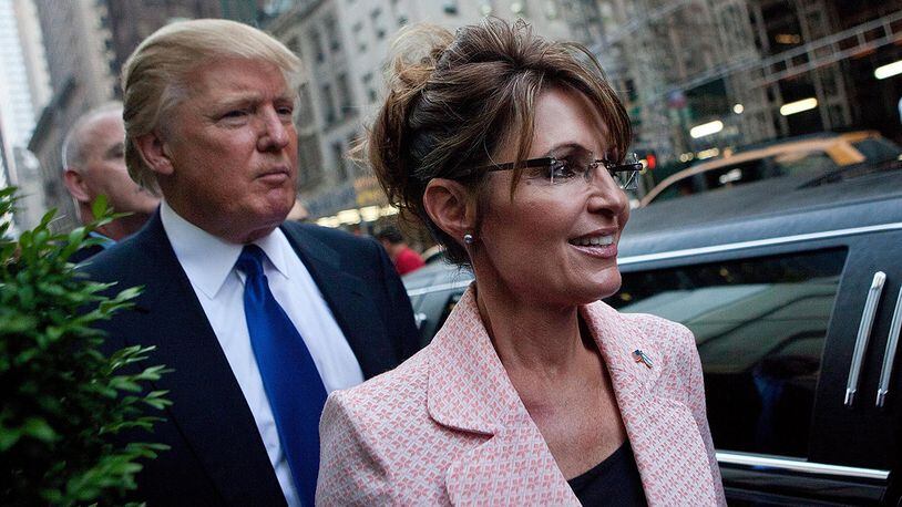 NEW YORK, NY - MAY 31: Former U.S. Vice presidential candidate and Alaska Governor Sarah Palin (R), and Donald Trump walk towards a limo after leaving Trump Tower, at 56th Street and 5th Avenue, on May 31, 2011 in New York City. Palin and Trump met for a dinner meeting in the city. (Photo by Andrew Burton/Getty Images)