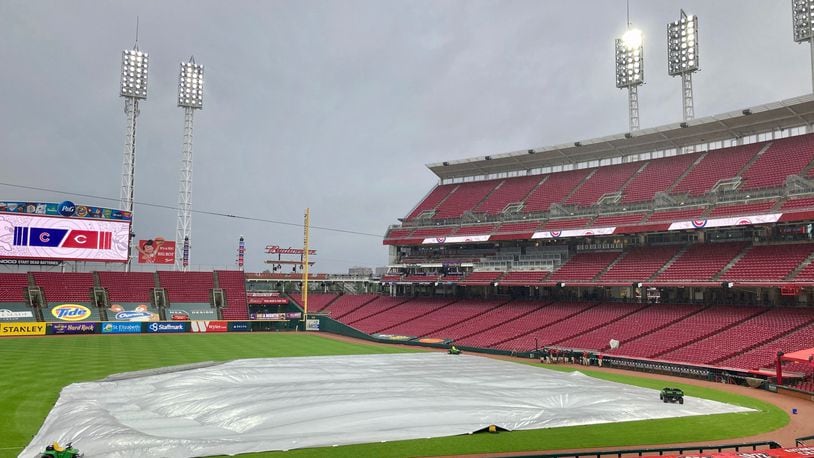 Rain falls at Great American Ball on Thursday, July 30, 2020, in Cincinnati. A game between the Reds and Cubs was postponed by rain.David Jablonski/Staff