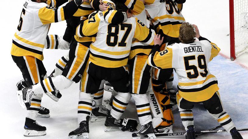 NASHVILLE, TN - JUNE 11: Matt Murray #30 of the Pittsburgh Penguins celebrates with teammates after they defeated the Nashville Predators 2-0 to win the 2017 NHL Stanley Cup Final at the Bridgestone Arena on June 11, 2017 in Nashville, Tennessee. (Photo by Patrick Smith/Getty Images)
