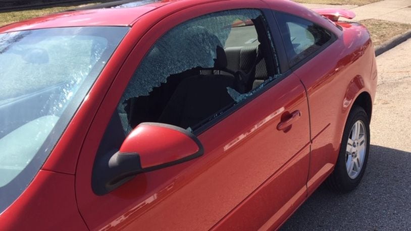 Springfield Police received at least 20 reports of car windows being shot at sometime between Monday night and early Tuesday morning. JENNA LAWSON/STAFF.