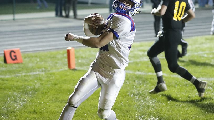Greeneview’s Clay Payton runs in for a Rams’ touchdown in the first quarter of the game at Madison-Plains during the 2017 season. Bill Lackey/Staff