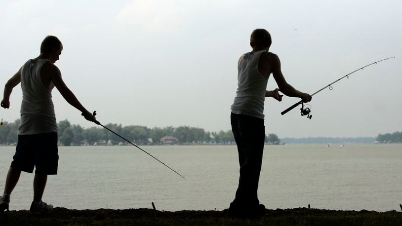 Anglers cast their lines near Russells Point at Indian Lake.