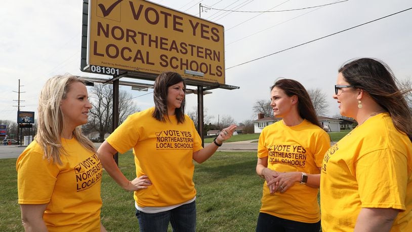 Northeastern Local Schools supporters, from left, Brittany Thompson, Michelle Haythe, Chrisdee Rastatter, Amanda Foulk discuss plans to get the word out about the Northeastern levy Friday, April 16, 2018. BILL LACKEY/STAFF