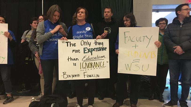 Wright State faculty union members protest at a January budget forum on campus.