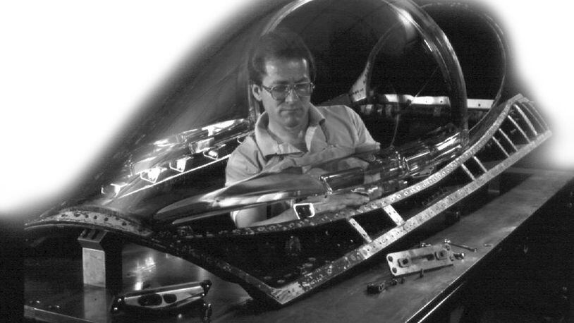 The undated photo from the University of Dayton Research Institute shows a researcher working in a cockpit. CONTRIBUTED