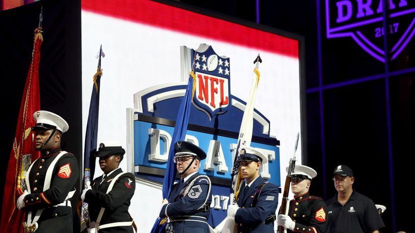 PHILADELPHIA, PA - APRIL 27:  Members of the military march on stage prior to the first round of the 2017 NFL Draft at the Philadelphia Museum of Art on April 27, 2017 in Philadelphia, Pennsylvania.  (Photo by Elsa/Getty Images)