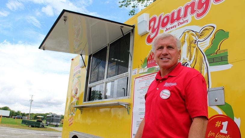 Ben Young is the co-owner of Young’s Jersey Dairy near Yellow Springs. The business sells cheese curds, ice cream and grilled cheese from its new food truck. AMELIA ROBINSON/STAFF