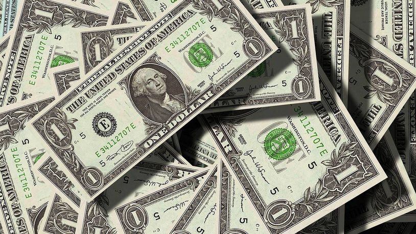 Motorists were scrambling Friday as dollar bills flew all over a Michigan highway.