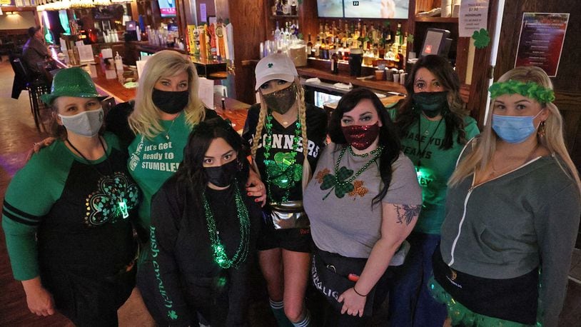 The staff at O'Conner's Irish Pub last year was showing the St. Patrick's Day spirit. BILL LACKEY/STAFF