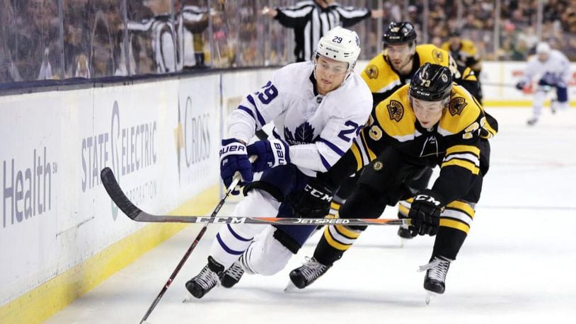 BOSTON, MA - APRIL 12: Charlie McAvoy #73 of the Boston Bruins and William Nylander #29 of the Toronto Maple Leafs battle for control of the puck during the second period of Game One of the Eastern Conference First Round during the 2018 NHL Stanley Cup Playoffs at TD Garden on April 12, 2018 in Boston, Massachusetts.  (Photo by Maddie Meyer/Getty Images)