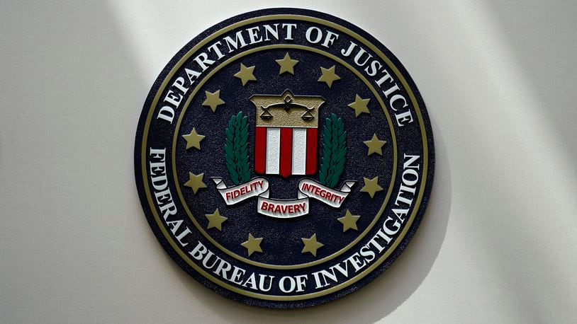 FILE - An FBI seal is seen on a wall on Aug. 10, 2022, in Omaha, Neb. The House was holding a key test vote Wednesday, April 10, 2024, on whether to consider a bill that would reauthorize a crucial national security surveillance program, but the prospects were uncertain amid intense Republican opposition as well as an edict earlier in the day from former President Donald Trump to “kill" the measure. Johnson has called the program “critically important” but has struggled to find a path forward on the issue, which has been plagued by partisan bickering for years. (AP Photo/Charlie Neibergall, File)