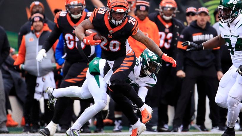 CINCINNATI, OHIO - DECEMBER 01: Joe Mixon #28 of the Cincinnati Bengals runs with the ball during the game against the New York Jets at Paul Brown Stadium on December 01, 2019 in Cincinnati, Ohio. (Photo by Andy Lyons/Getty Images)