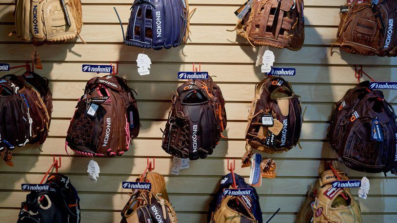 Baseball and softball gloves. (CREDIT: Cooper Neill/Bloomberg)