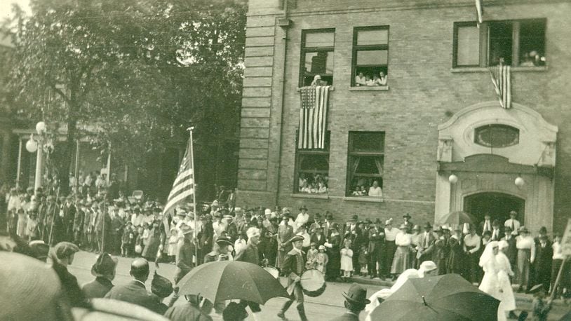 On May 21, 1918 the city of Springfield held a War Chest parade through downtown to encourage patriotism and emotional and financial support of the war. This photo shows the parade passing in front of the Elks Lodge at 126 W. High Street. Springfield Lodge No. 51, started on August 30, 1886, had opened the lodge in 1909. 100 years later, the Elks sold their lodge and moved to Northwood Hills Country Club and the building has found new life at the Buckeye Sports Lodge. PHOTO COURTESY OF THE CLARK COUNTY HISTORICAL SOCIETY