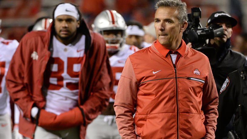 LINCOLN, NE - OCTOBER 14: Head coach Urban Meyer of the Ohio State Buckeyes leaves the field after the win against the Nebraska Cornhuskers at Memorial Stadium on October 14, 2017 in Lincoln, Nebraska. (Photo by Steven Branscombe/Getty Images)