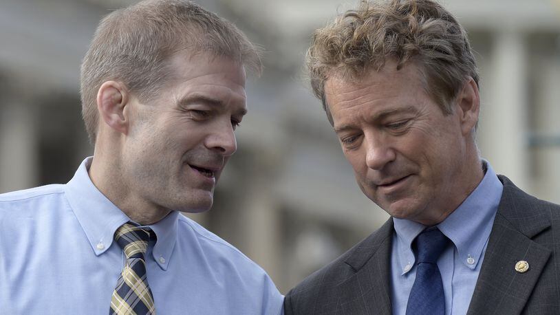 Rep. Jim Jordan, R-Ohio, left, talks with Sen. Rand Paul, R-Ky. during a news conference on health care, Tuesday, March 7, 2017, on Capitol Hill in Washington. (AP Photo/Susan Walsh)