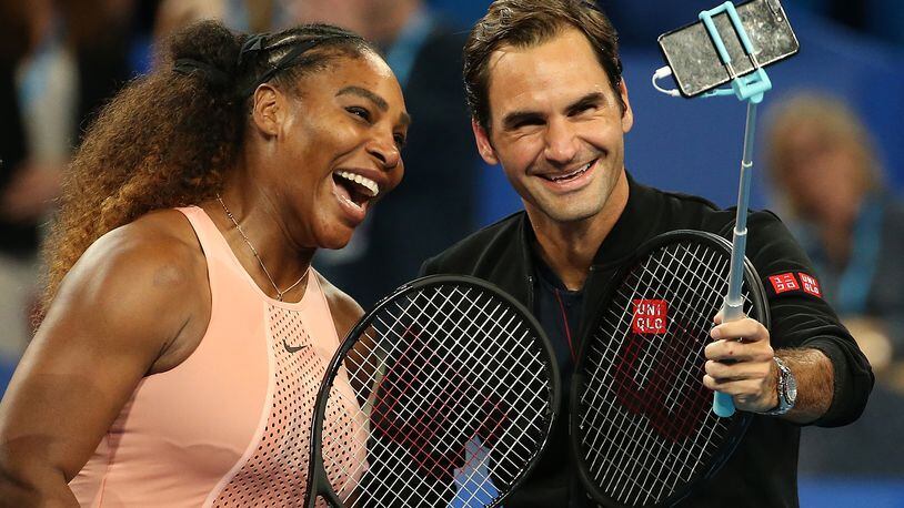 PERTH, AUSTRALIA - JANUARY 01: Serena Williams of the United States and Roger Federer of Switzerland take a selfie following their mixed doubles match during day four of the 2019 Hopman Cup at RAC Arena on January 01, 2019 in Perth, Australia. (Photo by Paul Kane/Getty Images)
