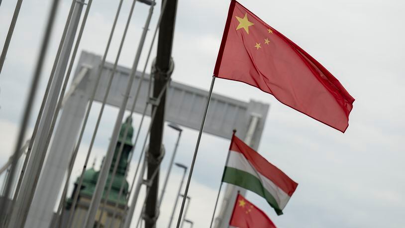 Chinese national flags are placed next to Hungarian flags on the Elisabeth Bridge in Budapest, Hungary, Wednesday, May 8, 2024. (AP Photo/Denes Erdos)