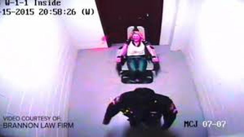 Montomery County Jail surveillance video obtained by a local attorney shows then Sgt. Judith Sealey pepper-spraying inmate Amber Swink, who was in a restraint chair. FILE/Staff