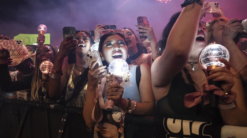 Festivalgoers are seen during the the first weekend of the Coachella Music and Arts Festival at the Empire Polo Club on Friday, April 12, 2024, in Indio, Calif. (Photo by Amy Harris/Invision/AP)