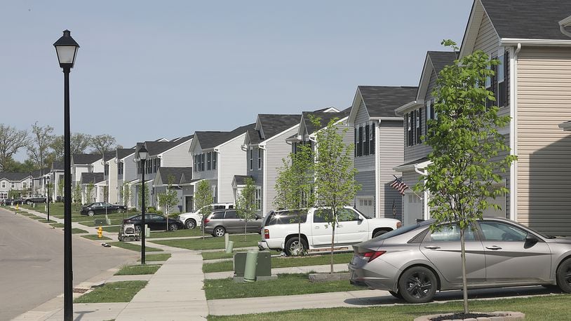 Dozens of new houses in a row. All part of the Bridgewater development. The developer DDC Management is aiming to build 258 more homes as part of a separate housing development called Sycamore Ridge. BILL LACKEY/STAFF