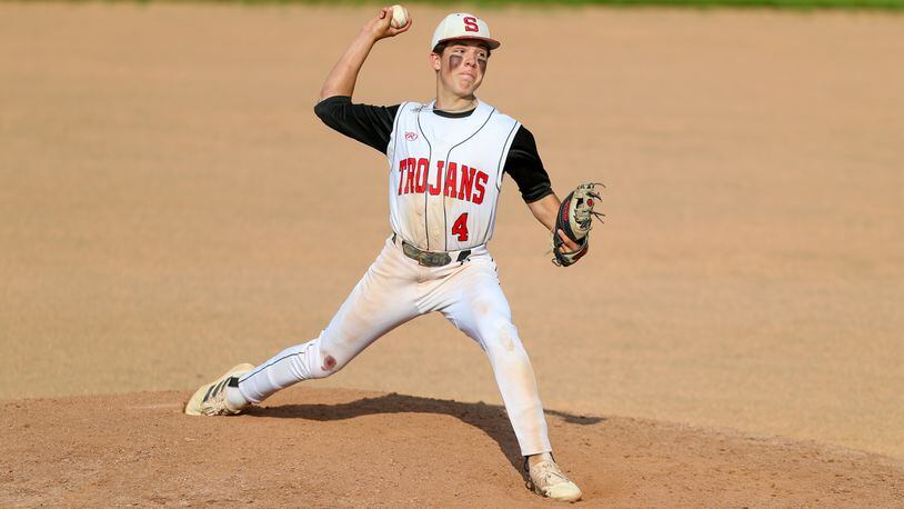 Southeastern High School junior pitcher Gehrig Cordial motions toward the plate during a Division IV district semifinal game against Catholic Central on Monday evening at South Charleston Community Park. The Trojans won 3-1. CONTRIBUTED PHOTO BY MICHAEL COOPER