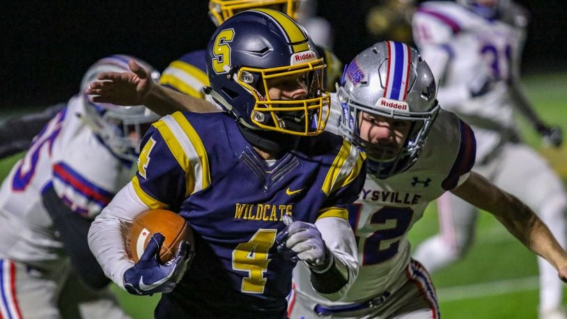 Springfield High School wide receiver James Wood II runs the ball during their Division I, Region 2 quarterfinal game against Marysville on Friday night at Springfield High School. The Wildcats on 23-0. CONTRIBUTED PHOTO BY MICHAEL COOPER