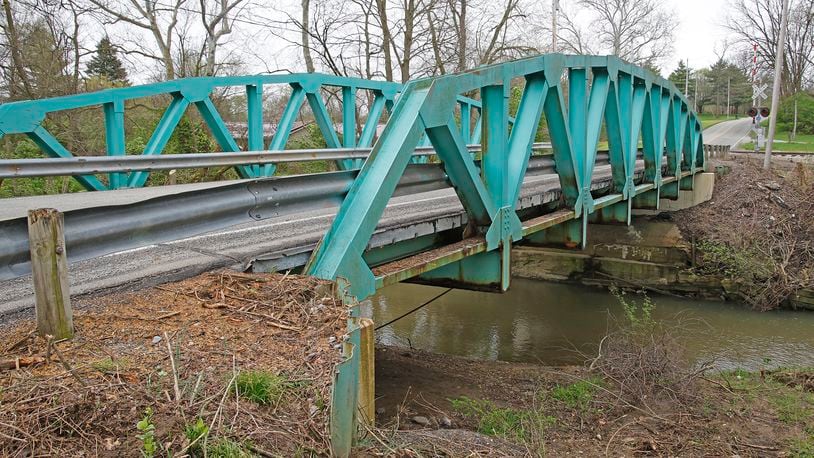 The Ohio Department of Transportation plans several road repair projects in Clark County, including replacing the Knollwood Road bridge over Chapman Creek. BILL LACKEY/STAFF