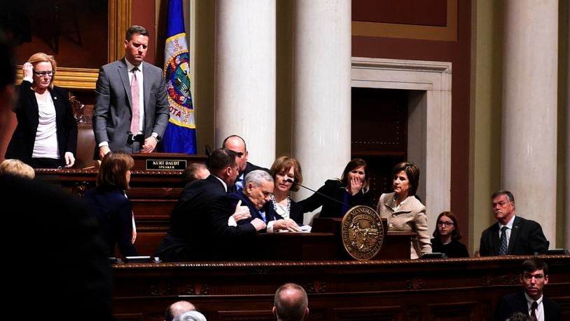 Minnesota Gov. Mark Dayton collapses while giving his annual State of the State address at the state Capitol in St. Paul, Minn., Monday, Jan. 23, 2017. The 69-year-old Democrat was helped into a back room and appeared to be conscious. (Scott Takushi/Pioneer Press via AP)