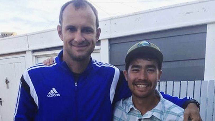 In this October 2018 photo, American adventurer John Allen Chau, right, stands for a photograph with Founder of Ubuntu Football Academy Casey Prince, 39, in Cape Town, South Africa, days before he left for in a remote Indian island of North Sentinel Island, where he was killed. Chau, who kayaked to the remote island populated by a tribe known for shooting at outsiders with bows and arrows, has been killed, police said Wednesday, Nov. 21. Officials said they were working with anthropologists to recover the body.