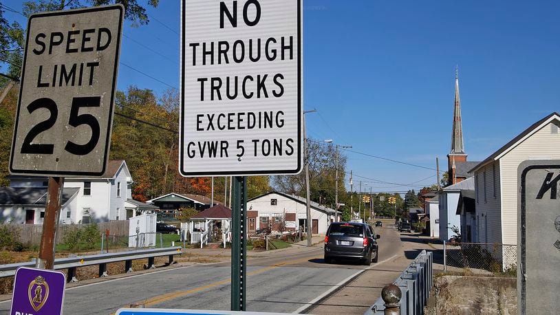 A sign, visible at the entrance to Tremont City on Upper Valley Pike, warns that no trucks over five tons are permitted. Tremont City Mayor Tony Flood II and Police Chief Chad Duncan said the ordinance was due to safety concerns. BILL LACKEY/STAFF
