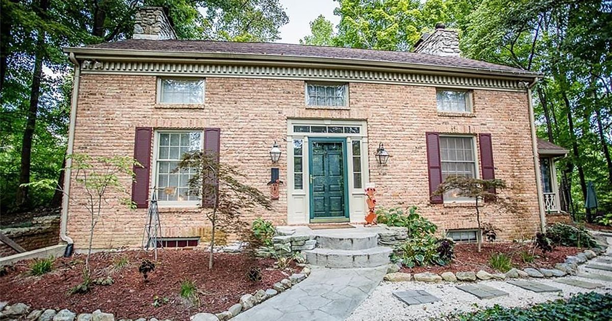 2-story on wooded lot has finished, walk-out basement