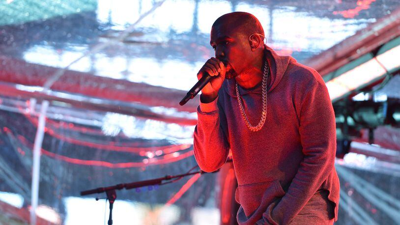 NEW YORK, NY - DECEMBER 01: Rapper Kanye West performs on World AIDS Day at 'A (RED) Thank You,' presented by (Bank of America)RED on December 1, 2014 in New York City. (Photo by Slaven Vlasic/Getty Images for (RED))