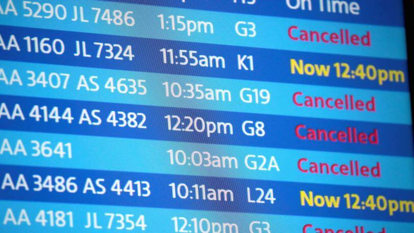 More than 1,100 flights at Chicago's airports were canceled Sunday because of snowy weather.